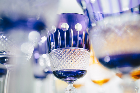 Purple glasses in a row - texture with light behind - for backgroundの写真素材