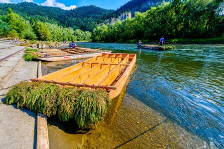 Sromowce Nizne, Poland - August 26, 2015; Traditional rafting on the Dunajec River on wooden boats. The rafting is very popular tourist attraction in Pieniny National Parkのeditorial素材