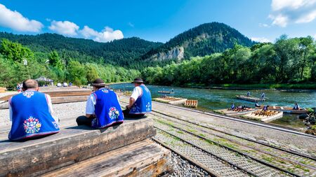 Sromowce Nizne, Poland - August 26, 2015; Traditional rafting on the Dunajec River on wooden boats. The rafting is very popular tourist attraction in Pieniny National Parkのeditorial素材