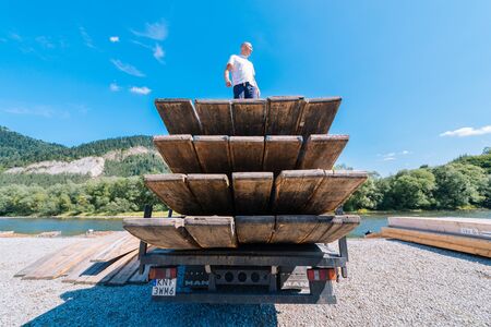 Sromowce Nizne, Poland - August 26, 2015; Traditional rafting on the Dunajec River on wooden boats. The rafting is very popular tourist attraction in Pieniny National Parkのeditorial素材