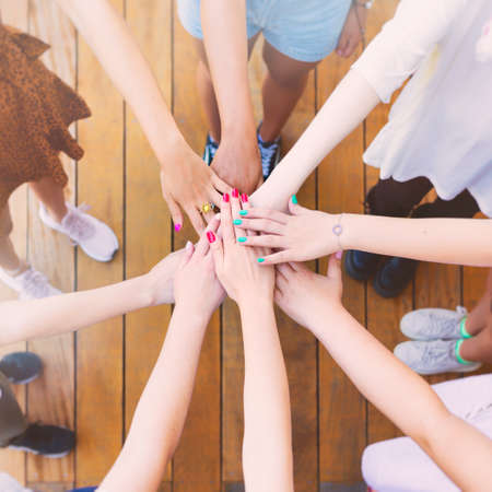 Stack of hands. Unity, teamwork and friendship conceptの写真素材