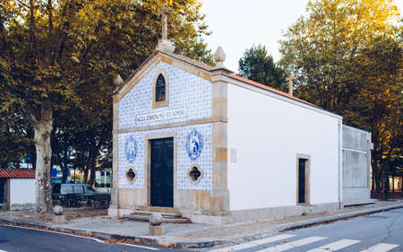 Porto, Portugal - October 2, 2018: Chapel of Our Lady Mother of Men (Capela de Nossa Senhora Mae dos Homens) - dated from the mid-19th century, has a simple rectangular floor plan with a blue and white tiles frontのeditorial素材