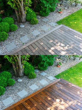 cleaning a wooden terrace with a high-pressure washer - BEFORE and AFTER cleaning and oiling wooden surfacesの写真素材