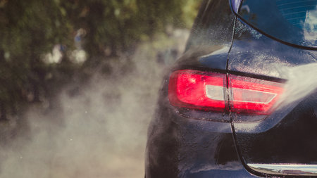 Car wash using high pressure water.  Power washing - cleaning concept.の写真素材