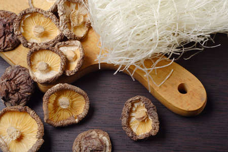 still life with shiitake mushrooms (Poku) (Lentinus edodes) and rice nodlesの写真素材