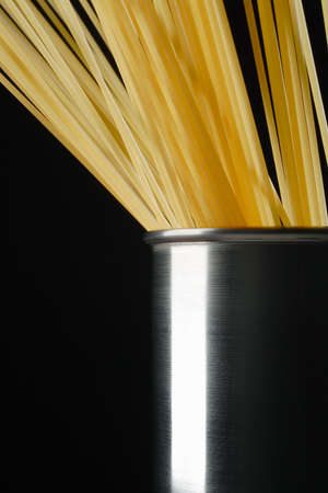 raw spaghetti in the stainless steel potの写真素材