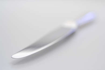 close-up of a silver knife blade with very limited depht of fieldの写真素材