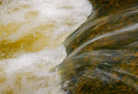 Close up photograph of a small cascade in the Holy Cross Mountains (Poland)の写真素材