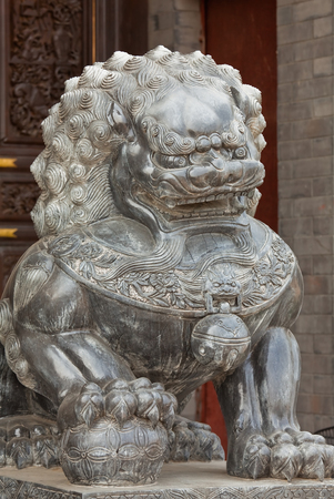 Bronze lion near the Emperor Temple in Forbidden Cityの写真素材