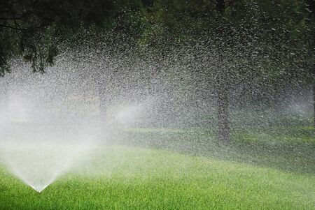 This is sprinkling machine in the gardenの写真素材