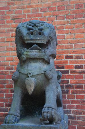 Stone lion near the entrance to Forbidden City