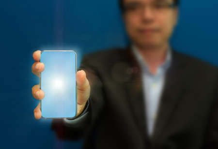 businessman hold the right virtual button for goal
