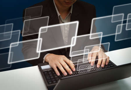 Business man working with laptop and virtual buttons as e-mail,business copy