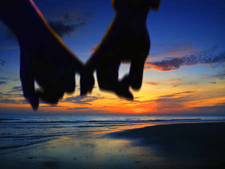 Couple holding handsの写真素材