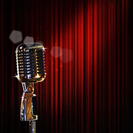 retro microphone and red curtainの写真素材