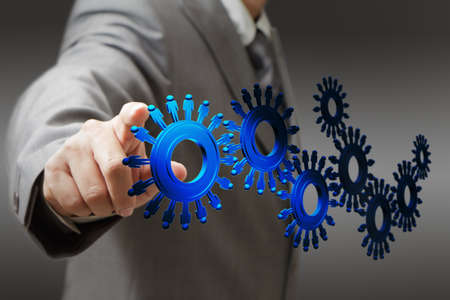 businessman and people cogs as conceptの写真素材
