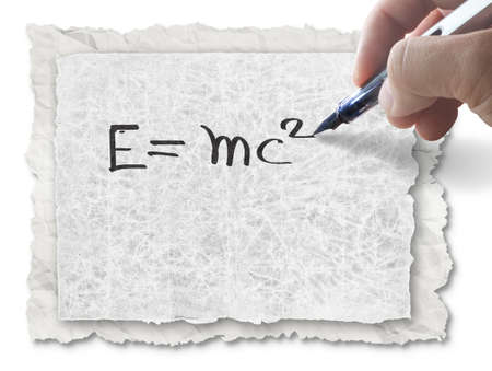 hand drawing E=mc2 on paperの写真素材