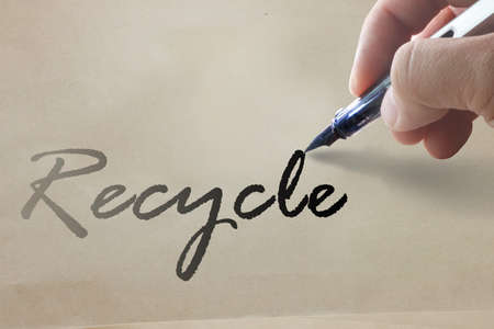 hand write recycle word on recycle paperの写真素材