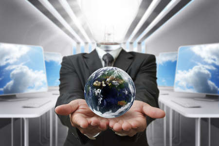 business man light bulb head and computer roomの写真素材