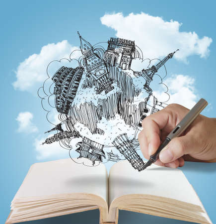 open book and hand drawing dream travelの写真素材