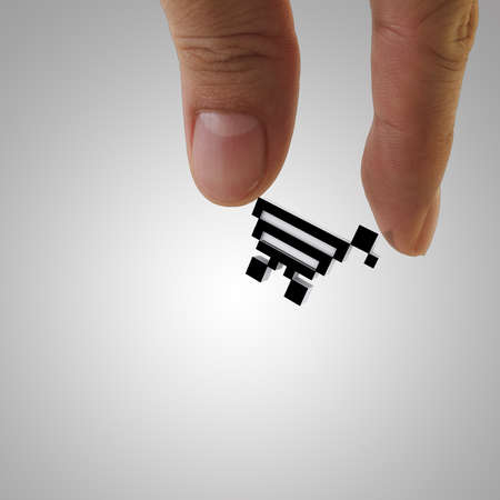 close up of fingers picking up shopping online icon as conceptの写真素材