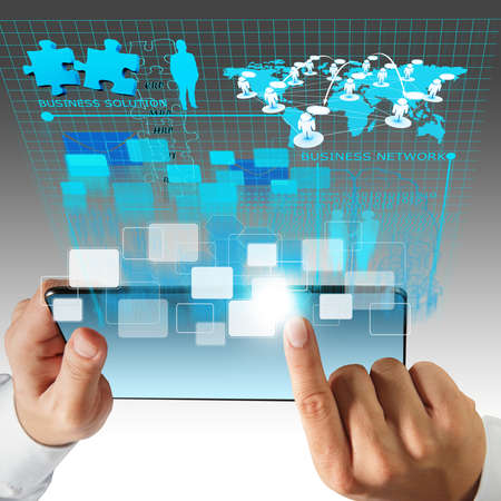business man hand point to virtual business network process diagramの写真素材