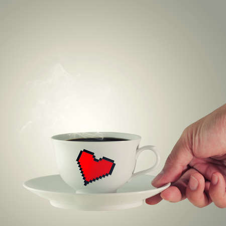 coffee cup with pixel hearth iconの写真素材