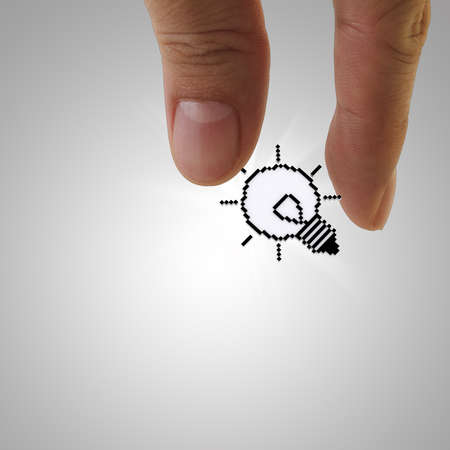 close up of pixel light bulb icon as conceptの写真素材