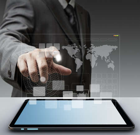 business man hand touch virtual screen computer interface as concept Elements of this image furnished by NASA の写真素材