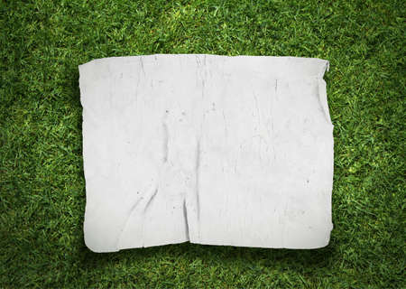 old fabric on grass backgroundの写真素材