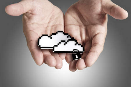 hands exhibiting the cloud computing pixel iconの写真素材