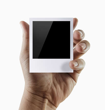 man hand holding  blank photo frameのeditorial素材