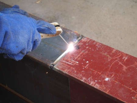 welding with mig-mag method on metal beamの写真素材