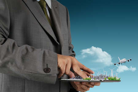 businessman hand holds touch pad as conceptの写真素材