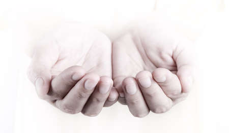 female open hands as if holding somethingの写真素材