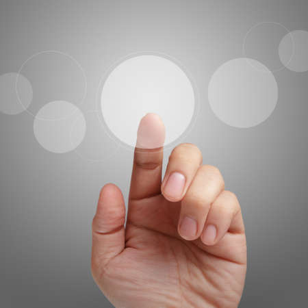 male hand point on touch screen interface as conceptの写真素材
