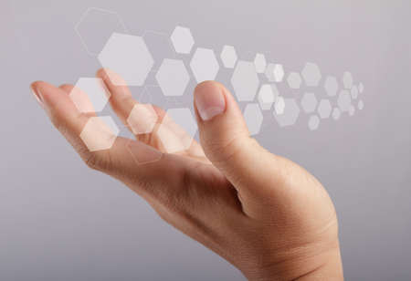 hand holds touch screen interface screen virtual buttonの写真素材