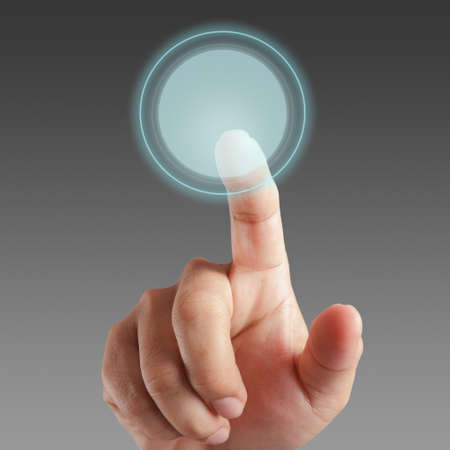 Hand and Touchscreen Technology as conceptの写真素材