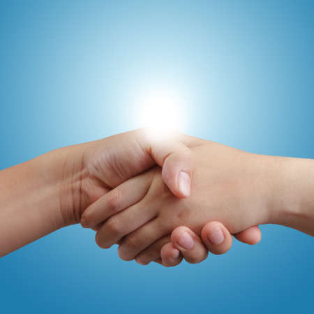 handshake and sunlight backgroundの写真素材