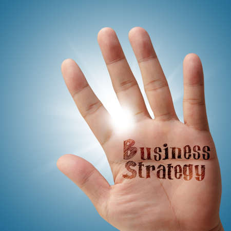 Business strategy on his hand as concept