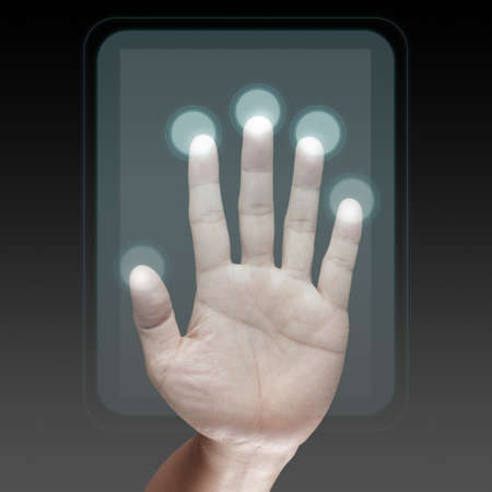 businessman hand pushing on a touch screen interfaceの写真素材