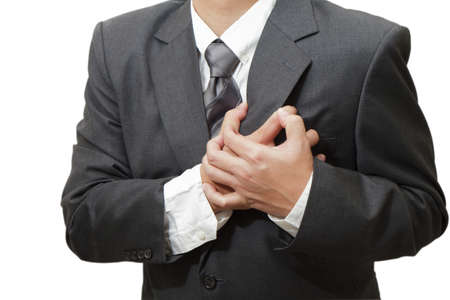 Senior man having a heart attack isolated on white backgroundの写真素材