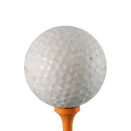 Golf ball on green teeの写真素材