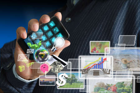 Touch screen mobile phone, in handの写真素材
