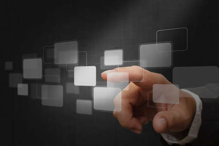 hand pushing on a touch screen interfaceの写真素材