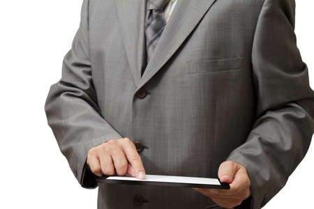 Handsome businessman using his digital tabletの写真素材