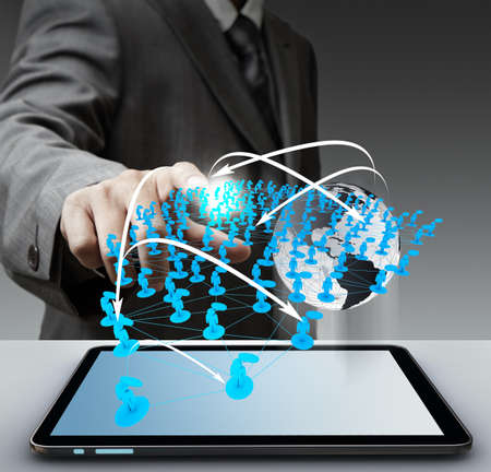 business man hand touch virtual social network "Elements of this image furnished by NASA"の写真素材