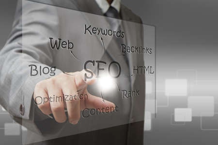 business man hand point on SEO diagram screenの写真素材