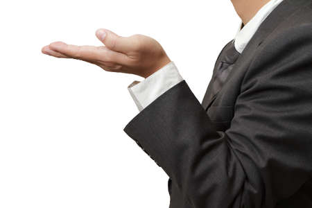 hands in offering gesture against black backgroundの写真素材