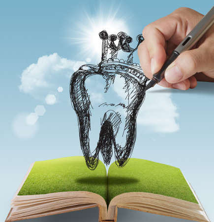 open book of hand drawn Tooth and Crownの写真素材